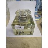 A large square Edwardian glass inkwell, with silver mount