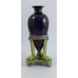 A 19th century George Jones majolica Amphora shaped vase, the dark blue body mounted on three