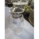 A silver topped sugar sifter