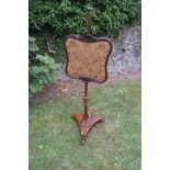 A Victorian rosewood pole screen, height 50ins