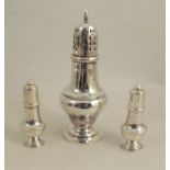 A silver sugar caster, of traditional form, Chester 1905, weight 3oz, height 7.5ins, together with a