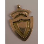 A 9ct gold shield shaped watch fob, weight 4.7g gross