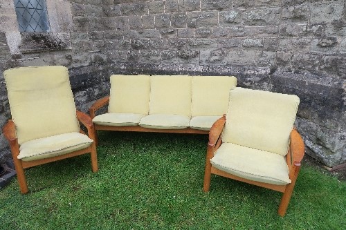 A 'Domino' Danish three piece suite, stamped, settee width 74ins, chairs width 30ins