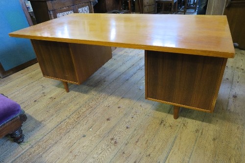 A large Gordon Russel teak twin pedestal desk, having a bank of drawers to one side and a fold - Image 3 of 4