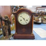 An Edwardian mahogany cased mantle clock, with white dial