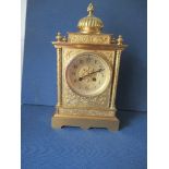 A French gilt metal striking mantle clock, retailed by Brundley's Ltd, Liverpool, the case moulded