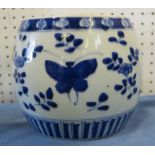 A Chinese jardiniere, decorated in blue with butterflies and foliage, diameter 6.5ins x height 5.