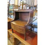 A 19th century mahogany commode, with rising lid, height 32ins, width 22.5ins