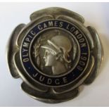 A 1908 London Olympics judge's badge, by Vaughton of Birmingham, together with a hallmarked silver