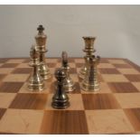 A Barrowclift Silvercraft silver chess set, the hallmarked silver pieces in an inlaid wooden box