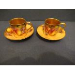 Two Royal Worcester coffee cans and saucers, decorated with hand painted fruit by RobertsCondition