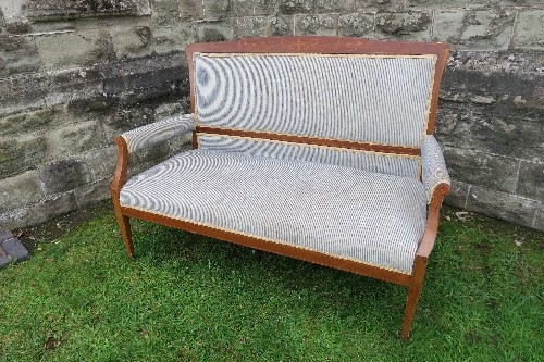 An Edwardian settee, with open arms, inlaid decoration, width 55ins, height 39ins