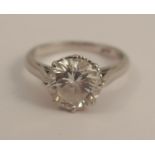 A diamond single stone ring, the white mount stamped 'Plat', the brilliant cut calculated as