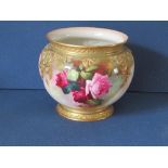 A Royal Worcester jardiniere, decorated with roses, shape H191, circa 1911, height 6.
