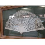 A cased ivory and mother of pearl fan, having 17 spines, width 14ins