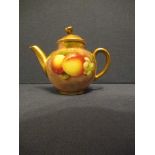 A Royal Worcester miniature tea pot, decorated with hand painted fruit by Roberts, height 3.