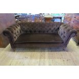 A Victorian drop end chesterfield, with brown upholstery, width 82ins