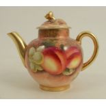 A Royal Worcester miniature teapot, decorated with fruit to a mossy background by Roberts, height