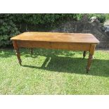 A Victorian pitch pine farmhouse table, 77ins x 33ins, height 30.5ins.