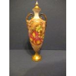 A Royal Worcester covered slender vase, decorated with hand painted fruit by Freeman, shape 2710/