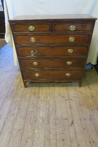 A 19th century mahogany chest of drawers, two short over four graduated drawers, raised on bracket