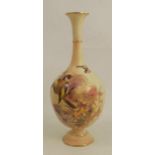 A Royal Worcester blush ivory quarter lobed vase, decorated with bullfinches and autumn leaves,