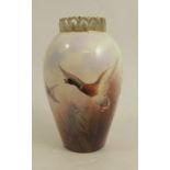 A Royal Worcester vase, decorated with mallards in flight by James Stinton, having pierced green