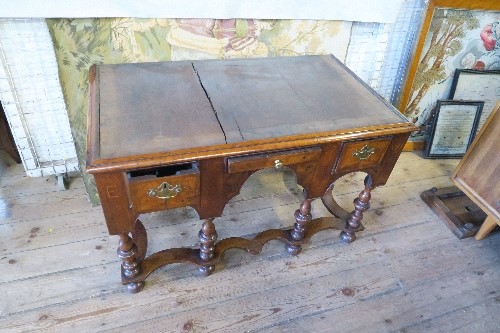 An 18th century walnut chest on stand, having two short drawers, over three long graduated long - Image 7 of 9