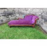 A Victorian chaise longue, with purple upholstery, width 70ins