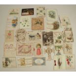 A collection of approximately 70 Victorian and later greetings cards, including some hand painted