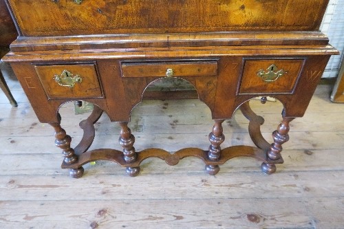 An 18th century walnut chest on stand, having two short drawers, over three long graduated long - Image 2 of 9