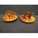 Two Royal Worcester coffee cans and saucers, decorated with hand painted fruit by RobertsCondition