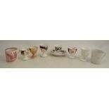 A collection of 18th and 19th egg cups and coffee cans, to include Sunderland lustre and Coalport