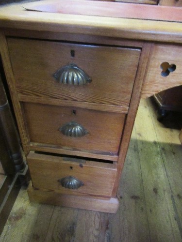 A pine desk, with leather top, having a bank of three drawers and a cupboard to each side, width - Image 3 of 4