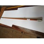 A Victorian horn tipped Malacca cane swagger stick, the rolled gold top mount engraved with the