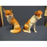 A Royal Worcester model of a seated fox, together with a seated hound, height approx 7.5insCondition