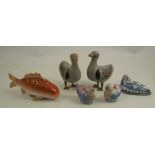 A Continental porcelain hat pin holder, formed as a coy carp, length 7.5ins, together with an