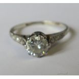 A single stone diamond ring, stamped '18ct' and 'Plat', the brilliant cut of approximately 0.8cts,