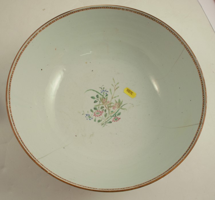 A Chinese export punch bowl, decorated with an armorial and flowers, hairline cracks, diameter - Image 2 of 6
