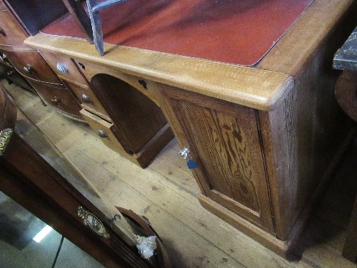 A pine desk, with leather top, having a bank of three drawers and a cupboard to each side, width - Image 2 of 4