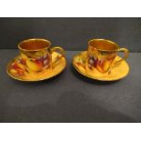 Two Royal Worcester coffee cans and saucers, decorated with hand painted fruit by RobertsCondition