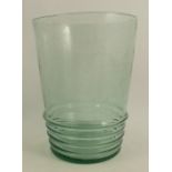 A late 19th century Arts & Crafts green bubble glass vase, with ribbing to the sides, and rough
