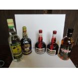 Two 500ml bottles of Grand Marnier, together with 70cl bottle of British Navy Purser's Rum, 70cl