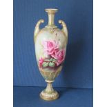 A Royal Worcester vase, decorated with roses by Jarman, heavily restored, height 14.75insCondition