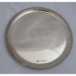 A circular silver tray, commemorating The Queens Silver Jubilee 1977, weight 8oz