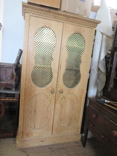 A pine cupboard, having two doors with Eastern style metal grill , opening to reveal shelves, - Image 2 of 5