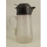 A Victorian silver mounted claret jug, the glass body and handle with spiral decoration, the