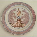 An early Bristol Delft sponged plate, with manganese decoration, diameter 8.75insCondition Report: