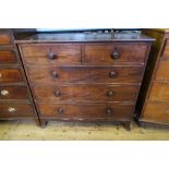A Victorian mahogany chest of drawers, having two short drawers over three graduated long drawers,