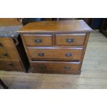 A pollard oak chest of drawers, having two short drawers over two graduated long drawers, width